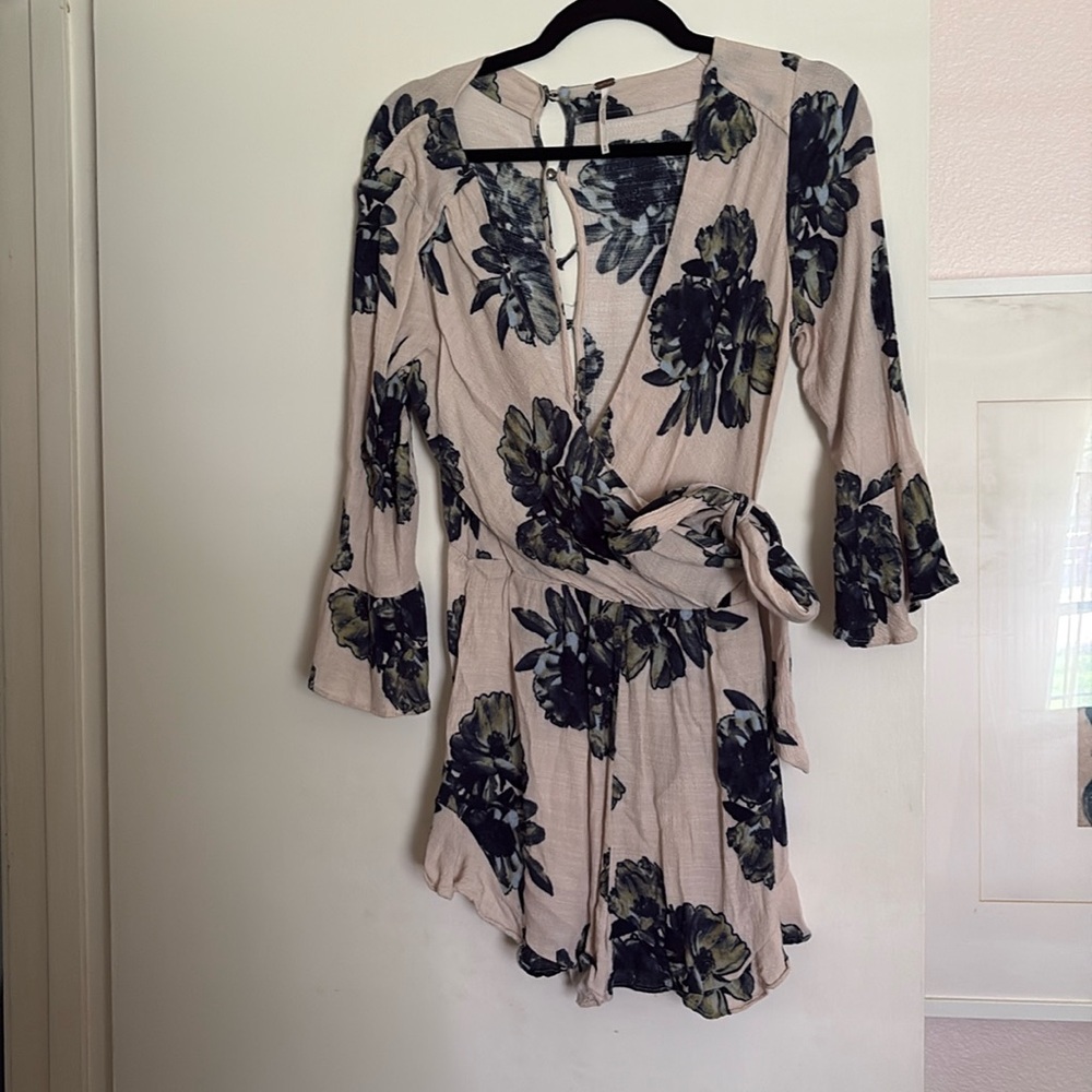 Free people cream romper with blue/green flowers size XS